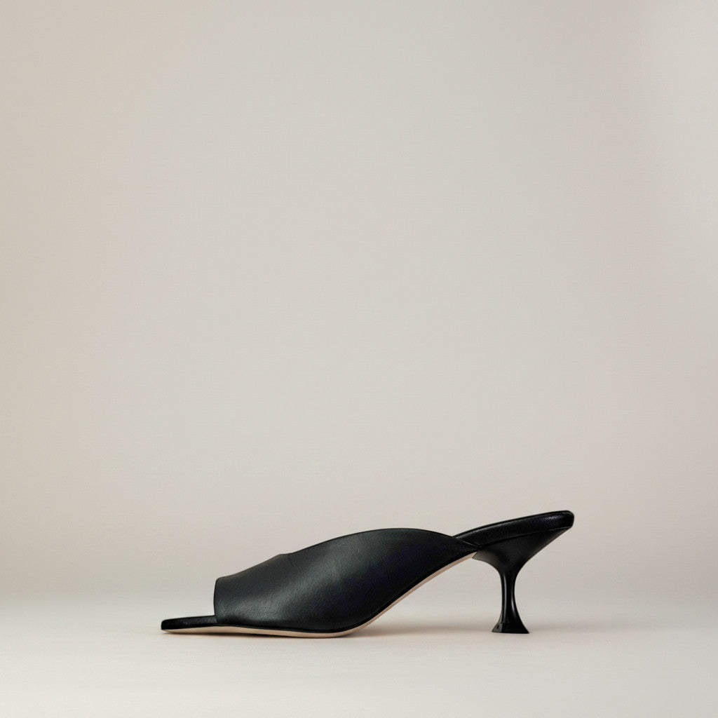 Inscarpa Kammi Fanti black leather mule sandals with a flared heel, perfect for warm weather and casual wear.