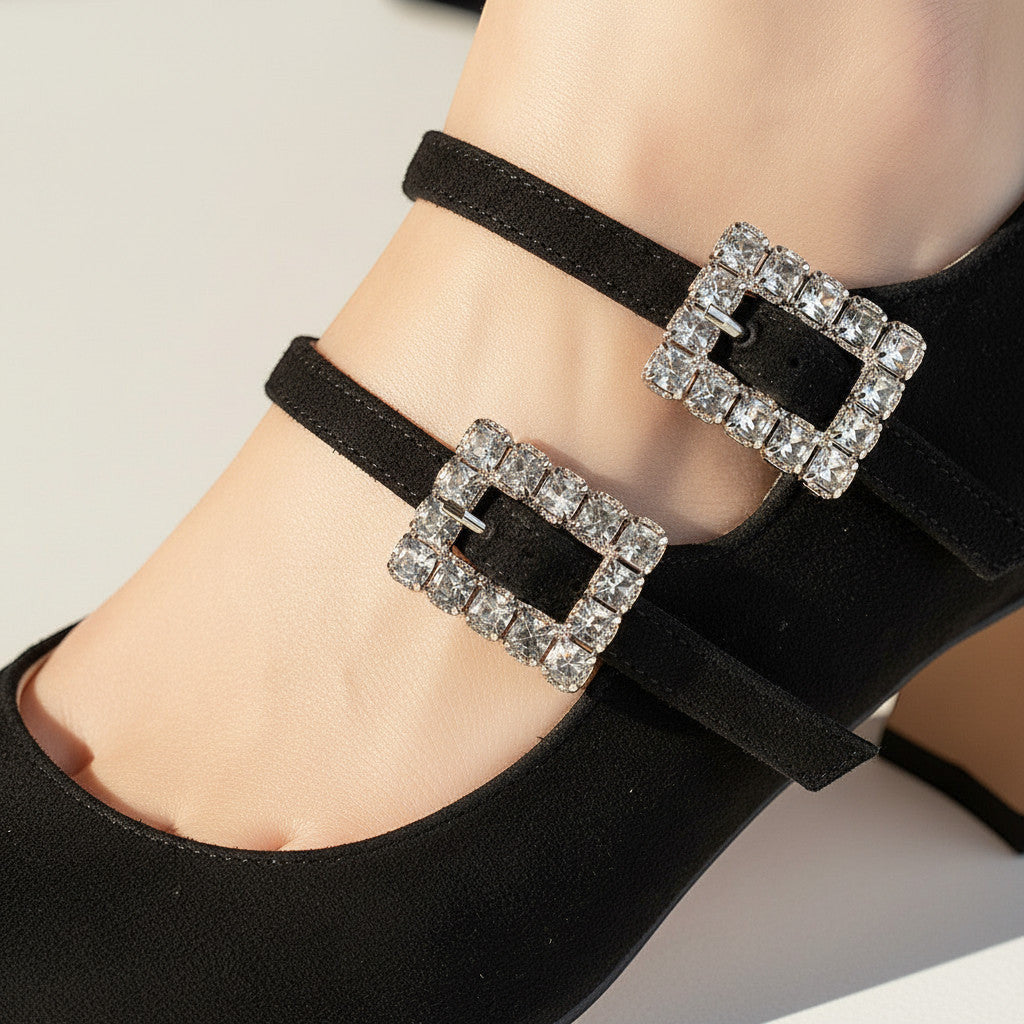 Inscarpa black suede women's Mary Jane shoes with jeweled buckles and block heel.